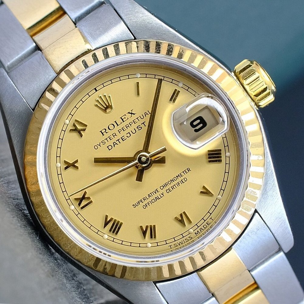 ROLEX DATEJUST LADIES WATCH GOLD STEEL CHAMPAGNE ROMAN DIAL FLUTED 69173 OYSTER